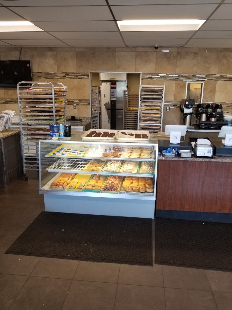 A Cozy Little Cafe Feel With A Display Case That Does The Talking