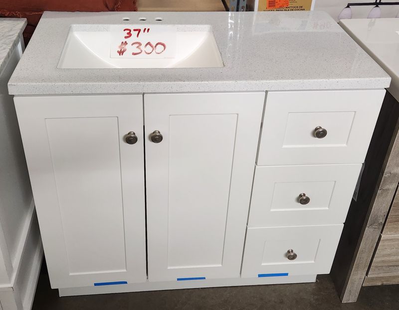 Tools, Vanities, And A Riding Mower Walk Into A Warehouse