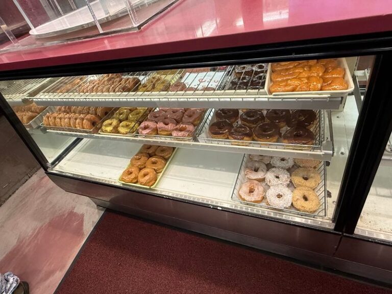 Massive Apple Fritters Share The Counter With Real Strawberry Donuts At This Illinois Shop