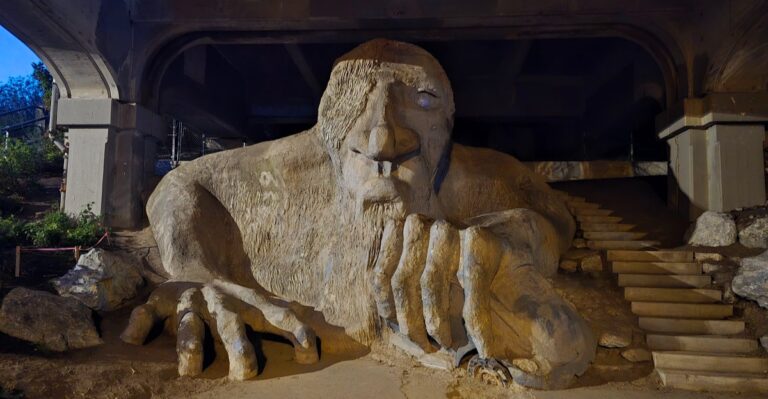 An 18-Foot Troll Lives In Washington, Under This Seattle Bridge, Crushing A Real Volkswagen Beetle In His Hand